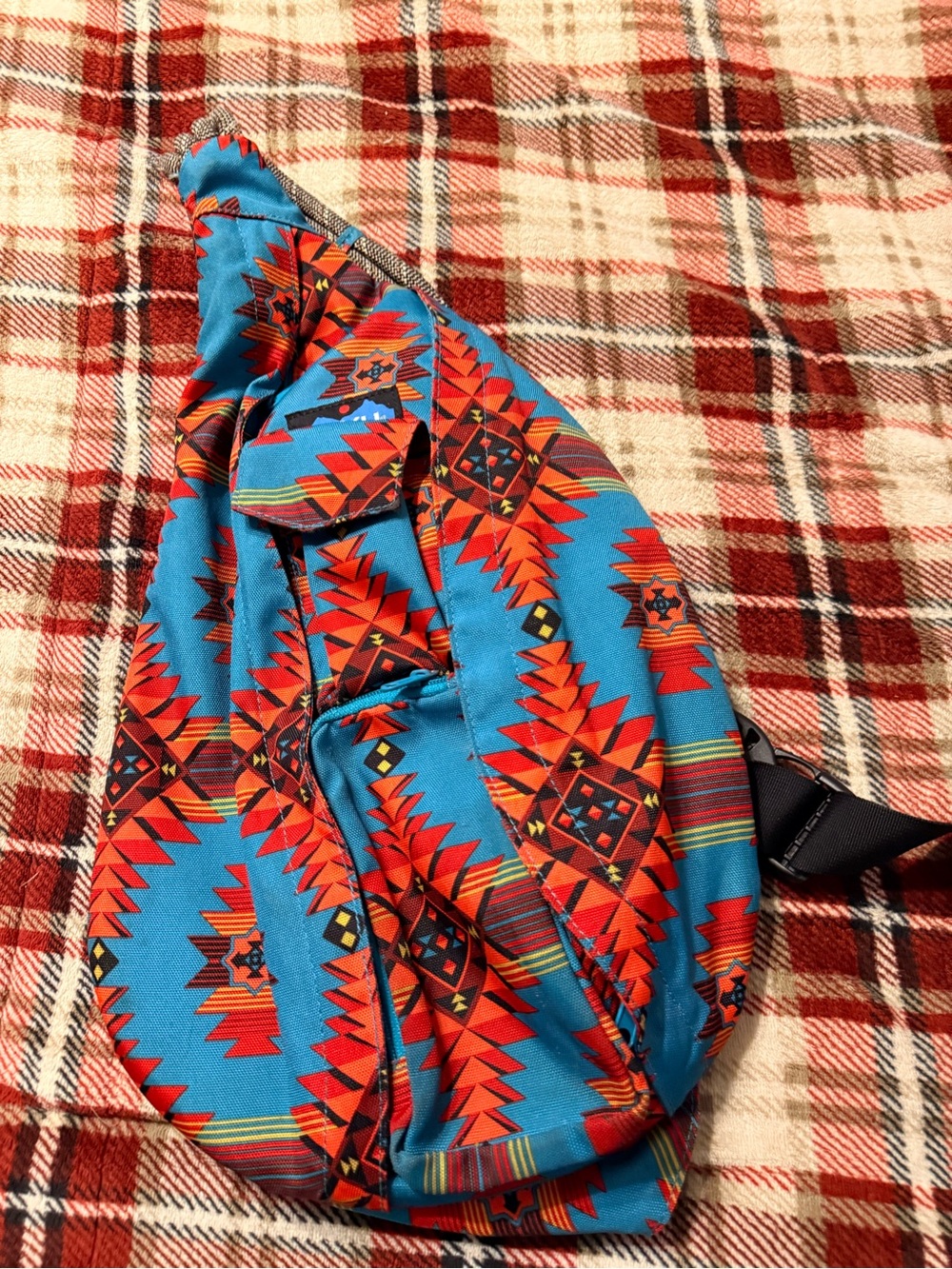Kavu Turquoise Sling Bag with Red Aztec Print